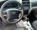 Красный Киа Черато, объемом двигателя 2 л и пробегом 280 тыс. км за 4200 $, фото 6 на Automoto.ua