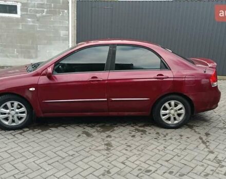 Червоний Кіа Черато, об'ємом двигуна 1.59 л та пробігом 245 тис. км за 3300 $, фото 3 на Automoto.ua