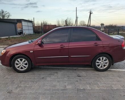 Красный Киа Черато, объемом двигателя 1.6 л и пробегом 240 тыс. км за 3750 $, фото 1 на Automoto.ua