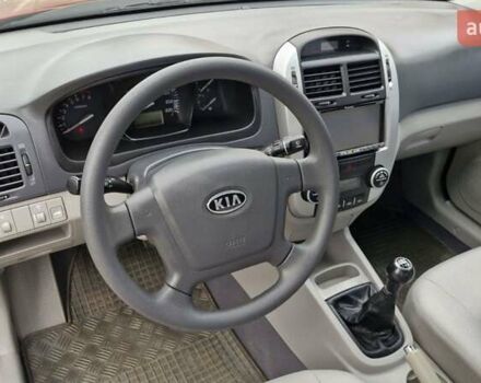 Красный Киа Черато, объемом двигателя 1.98 л и пробегом 120 тыс. км за 5650 $, фото 1 на Automoto.ua