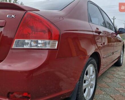 Красный Киа Черато, объемом двигателя 1.98 л и пробегом 120 тыс. км за 5650 $, фото 2 на Automoto.ua