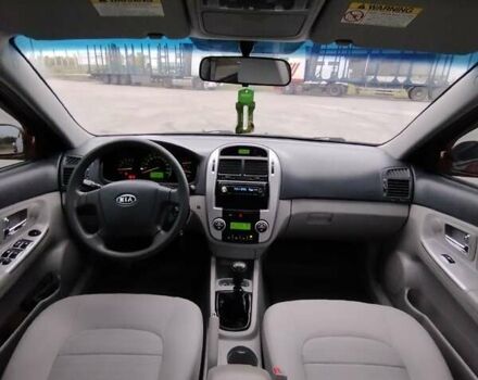 Кіа Черато 2008 у Коростене на Automoto.ua Червоний Кіа Черато, об'ємом двигуна 1.6 л та пробігом 126 тис. км за 5599 $, фото 30 на Automoto.ua