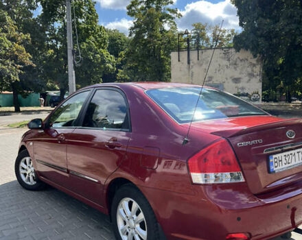 Красный Киа Черато, объемом двигателя 1.98 л и пробегом 256 тыс. км за 5500 $, фото 7 на Automoto.ua