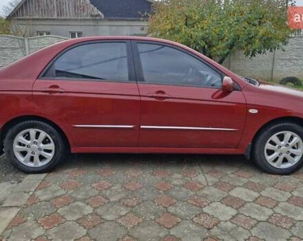 Красный Киа Черато, объемом двигателя 1.98 л и пробегом 120 тыс. км за 5650 $, фото 11 на Automoto.ua