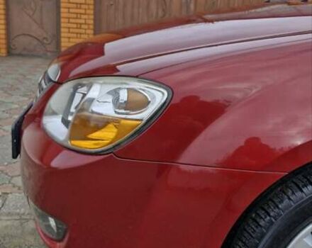 Красный Киа Черато, объемом двигателя 1.98 л и пробегом 120 тыс. км за 5650 $, фото 8 на Automoto.ua