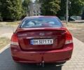 Красный Киа Черато, объемом двигателя 2 л и пробегом 256 тыс. км за 5500 $, фото 2 на Automoto.ua