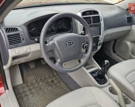 Красный Киа Черато, объемом двигателя 1.98 л и пробегом 120 тыс. км за 5650 $, фото 32 на Automoto.ua