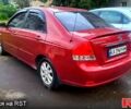 Красный Киа Черато, объемом двигателя 2 л и пробегом 254 тыс. км за 5300 $, фото 1 на Automoto.ua