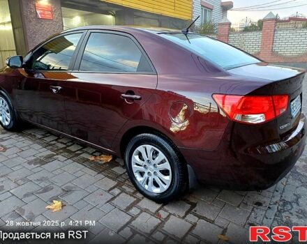 Киа Черато 2009 в Николаеве на Automoto.ua Красный Киа Черато, объемом двигателя 1.6 л и пробегом 170 тыс. км за 6200 $, фото 8 на Automoto.ua