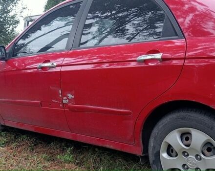 Красный Киа Черато, объемом двигателя 1.6 л и пробегом 250 тыс. км за 1200 $, фото 1 на Automoto.ua