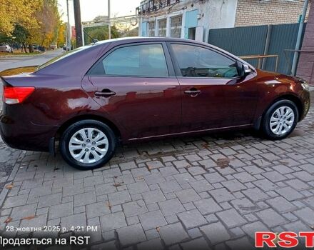 Киа Черато 2009 в Николаеве на Automoto.ua Красный Киа Черато, объемом двигателя 1.6 л и пробегом 170 тыс. км за 6200 $, фото 12 на Automoto.ua