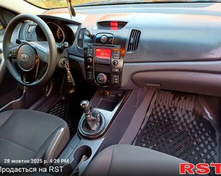 Киа Черато 2009 в Николаеве на Automoto.ua Красный Киа Черато, объемом двигателя 1.6 л и пробегом 170 тыс. км за 6200 $, фото 3 на Automoto.ua