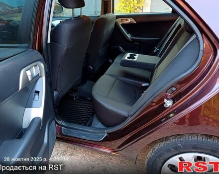 Киа Черато 2009 в Николаеве на Automoto.ua Красный Киа Черато, объемом двигателя 1.6 л и пробегом 170 тыс. км за 6200 $, фото 4 на Automoto.ua