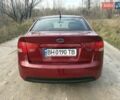 Красный Киа Черато, объемом двигателя 1.59 л и пробегом 276 тыс. км за 4800 $, фото 6 на Automoto.ua