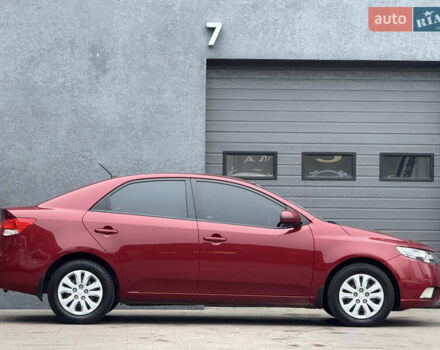 Красный Киа Черато, объемом двигателя 1.6 л и пробегом 200 тыс. км за 8900 $, фото 4 на Automoto.ua