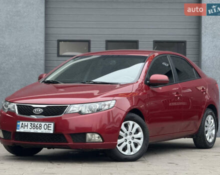 Красный Киа Черато, объемом двигателя 1.6 л и пробегом 200 тыс. км за 8900 $, фото 1 на Automoto.ua