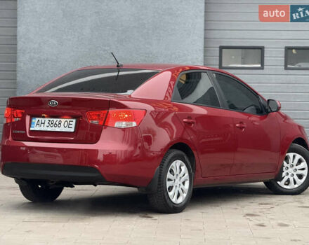 Красный Киа Черато, объемом двигателя 1.6 л и пробегом 200 тыс. км за 8900 $, фото 2 на Automoto.ua