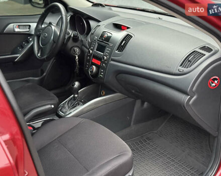 Красный Киа Черато, объемом двигателя 1.6 л и пробегом 200 тыс. км за 8900 $, фото 13 на Automoto.ua
