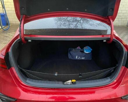 Червоний Кіа Черато, об'ємом двигуна 2 л та пробігом 101 тис. км за 13800 $, фото 8 на Automoto.ua