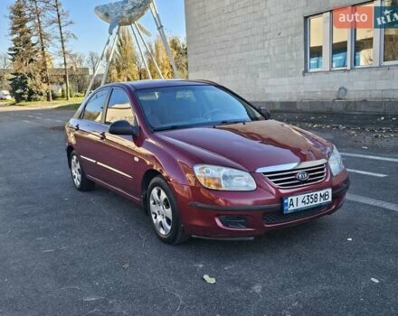 Красный Киа Черато, объемом двигателя 1.6 л и пробегом 200 тыс. км за 2600 $, фото 1 на Automoto.ua