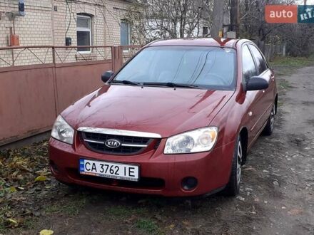 Красный Киа Черато, объемом двигателя 1.6 л и пробегом 229 тыс. км за 4500 $, фото 1 на Automoto.ua