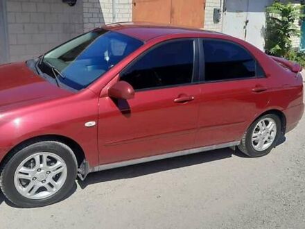 Красный Киа Черато, объемом двигателя 2 л и пробегом 144 тыс. км за 5400 $, фото 1 на Automoto.ua