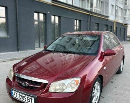 Червоний Кіа Черато, об'ємом двигуна 2 л та пробігом 234 тис. км за 3999 $, фото 1 на Automoto.ua