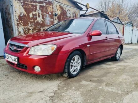 Красный Киа Черато, объемом двигателя 2 л и пробегом 233 тыс. км за 4700 $, фото 1 на Automoto.ua