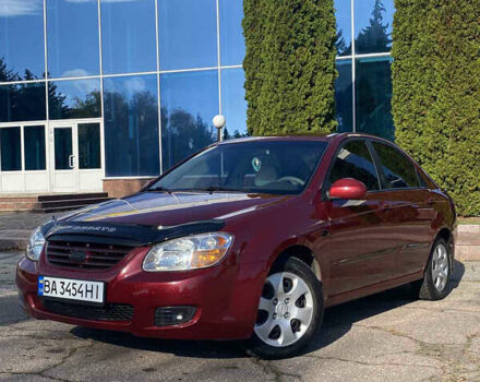 Красный Киа Черато, объемом двигателя 1.6 л и пробегом 239 тыс. км за 4900 $, фото 1 на Automoto.ua