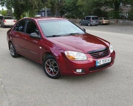 Красный Киа Черато, объемом двигателя 1.59 л и пробегом 203 тыс. км за 5800 $, фото 1 на Automoto.ua