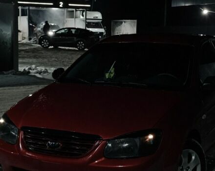 Красный Киа Черато, объемом двигателя 1.6 л и пробегом 295 тыс. км за 4200 $, фото 1 на Automoto.ua