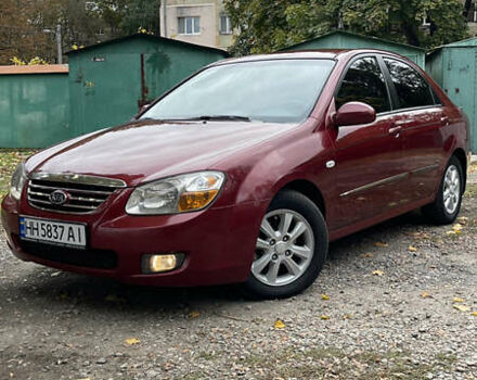 Красный Киа Черато, объемом двигателя 1.98 л и пробегом 189 тыс. км за 5500 $, фото 1 на Automoto.ua