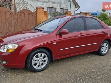 Красный Киа Черато, объемом двигателя 1.98 л и пробегом 120 тыс. км за 5650 $, фото 1 на Automoto.ua