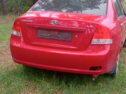 Красный Киа Черато, объемом двигателя 1.6 л и пробегом 250 тыс. км за 1200 $, фото 1 на Automoto.ua