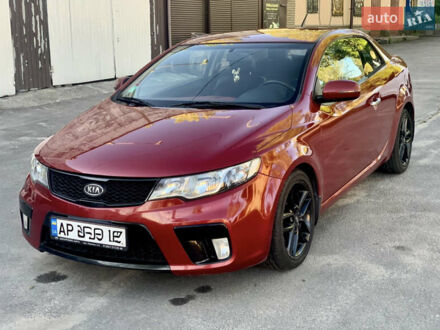 Красный Киа Черато, объемом двигателя 2 л и пробегом 155 тыс. км за 8900 $, фото 1 на Automoto.ua