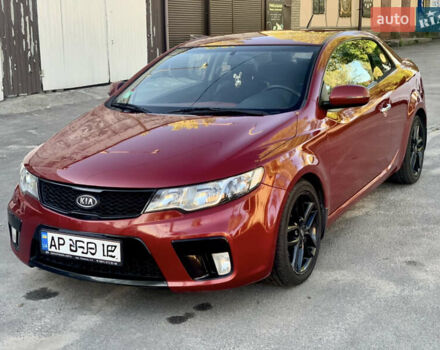 Червоний Кіа Черато, об'ємом двигуна 2 л та пробігом 155 тис. км за 8900 $, фото 1 на Automoto.ua