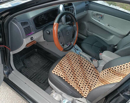 Киа Черато, объемом двигателя 2 л и пробегом 298 тыс. км за 4000 $, фото 11 на Automoto.ua