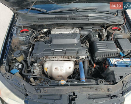 Киа Черато, объемом двигателя 2 л и пробегом 298 тыс. км за 4000 $, фото 12 на Automoto.ua