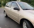 Жовтий Кіа Черато, об'ємом двигуна 1.6 л та пробігом 240 тис. км за 4200 $, фото 1 на Automoto.ua
