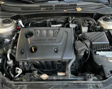 Жовтий Кіа Черато, об'ємом двигуна 1.6 л та пробігом 213 тис. км за 4800 $, фото 6 на Automoto.ua