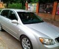 Сірий Кіа Черато, об'ємом двигуна 2 л та пробігом 340 тис. км за 5100 $, фото 3 на Automoto.ua