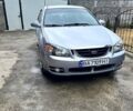Сірий Кіа Черато, об'ємом двигуна 1.6 л та пробігом 220 тис. км за 3550 $, фото 11 на Automoto.ua