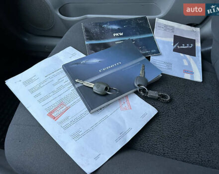 Серый Киа Черато, объемом двигателя 1.6 л и пробегом 177 тыс. км за 4000 $, фото 24 на Automoto.ua