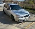 Серый Киа Черато, объемом двигателя 2 л и пробегом 326 тыс. км за 3500 $, фото 1 на Automoto.ua