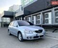 Серый Киа Черато, объемом двигателя 1.6 л и пробегом 190 тыс. км за 3850 $, фото 1 на Automoto.ua