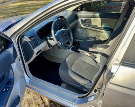 Серый Киа Черато, объемом двигателя 1.6 л и пробегом 221 тыс. км за 3500 $, фото 8 на Automoto.ua