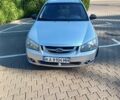 Серый Киа Черато, объемом двигателя 1.6 л и пробегом 210 тыс. км за 2500 $, фото 1 на Automoto.ua