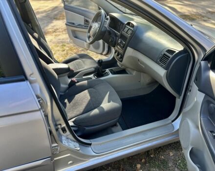 Серый Киа Черато, объемом двигателя 1.6 л и пробегом 221 тыс. км за 3500 $, фото 11 на Automoto.ua