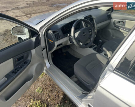 Серый Киа Черато, объемом двигателя 1.49 л и пробегом 257 тыс. км за 4400 $, фото 7 на Automoto.ua