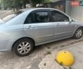 Серый Киа Черато, объемом двигателя 2 л и пробегом 197 тыс. км за 4500 $, фото 1 на Automoto.ua